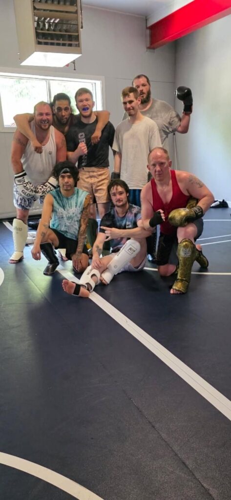 Group of J's Kickboxing Club members after a sparring session in Jefferson, WI