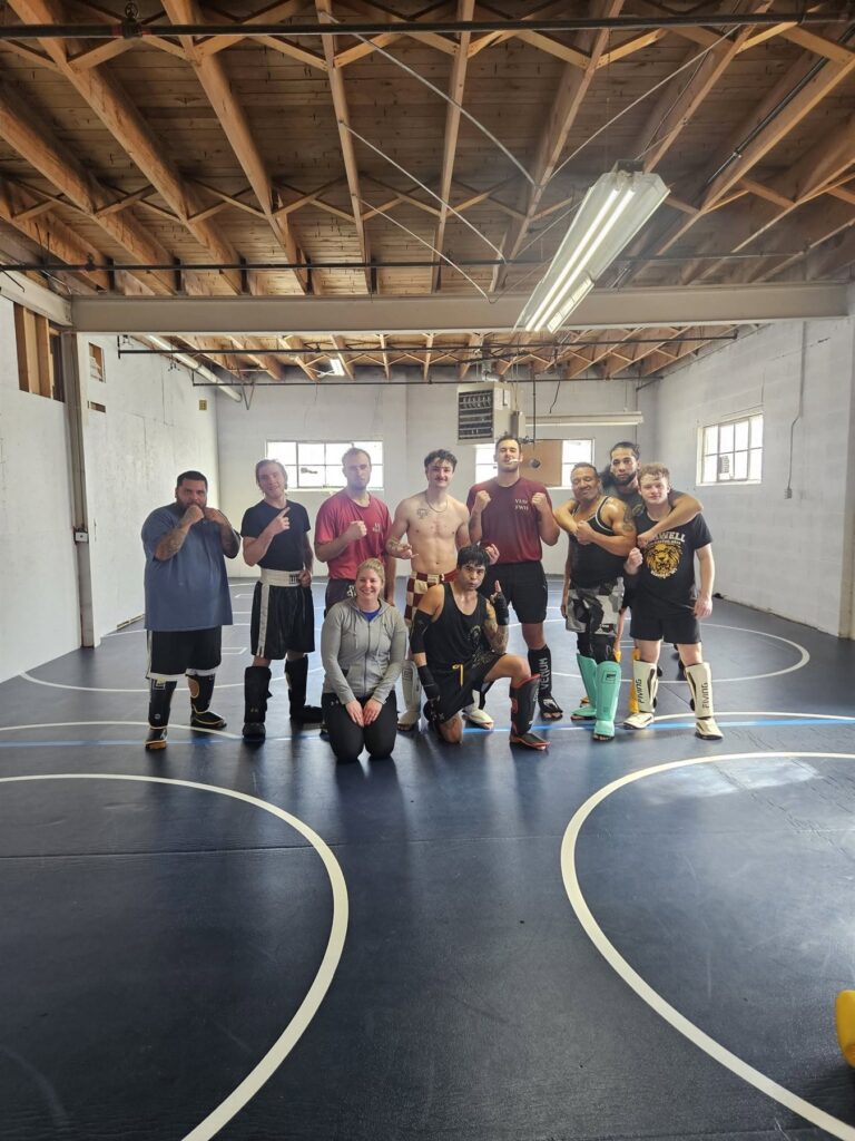 J's Kickboxing Club members training together in the Jefferson, WI gym